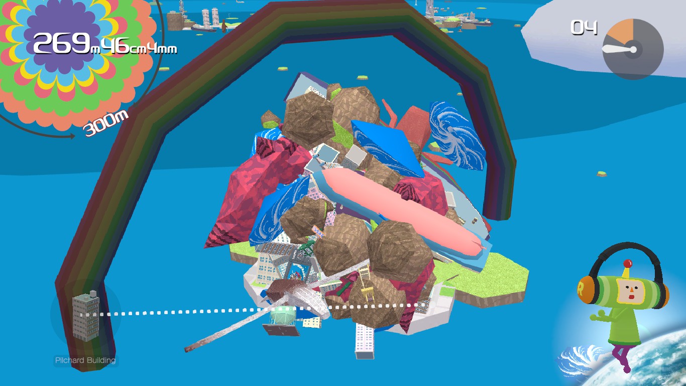 Игровой процесс Katamari Damacy Reroll: огромный шар собирает здания и другие объекты
